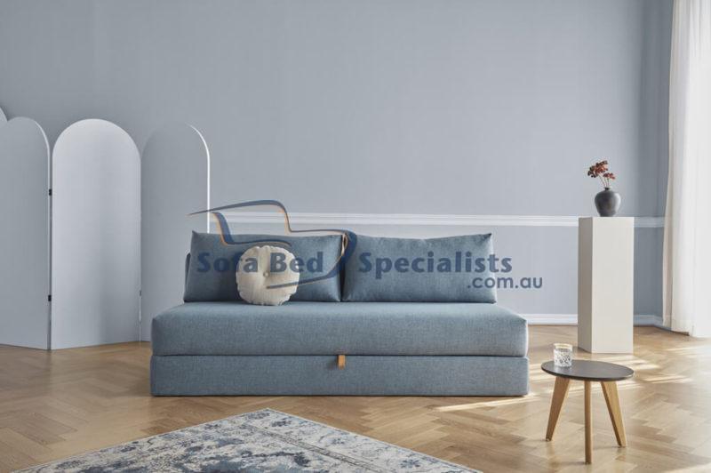 Sydney Storage Queen Size Sofa Bed with round cushion on timber floors